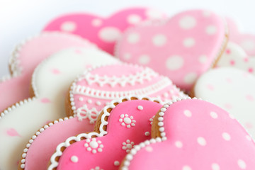 Set of pink heart shaped cookies with patterns, handmade products