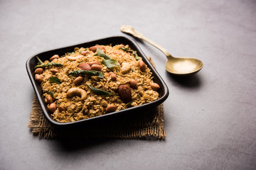 Oats Chivda / Chiwda is a healthy indian recipe with added chilli, peanuts, cashew, almond and...
