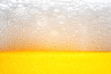Light Beer with Bubbles and Foam Background. Beer Bubbles Texture Close Up