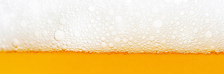 Light Beer with Bubbles and Foam Background. Beer Bubbles Texture Close Up