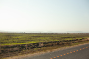 Fototapeta premium A beautiful photograph of a road in an open area.