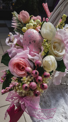 Beautiful floral arrangement of artificial flowers for Easter