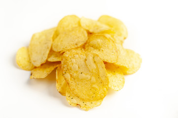 potato chips in a bowl, beer snacks on a white background