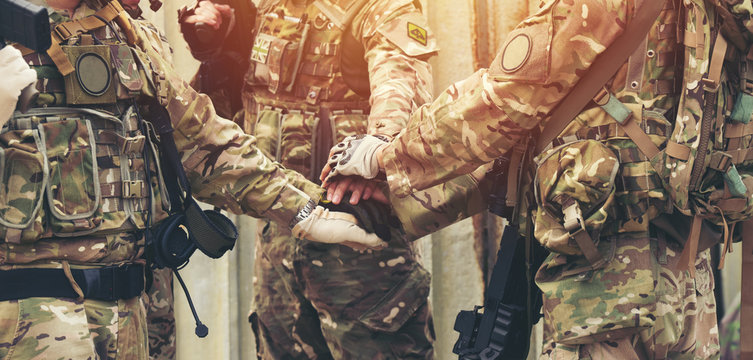 together collaborate of hands teamwork soldier