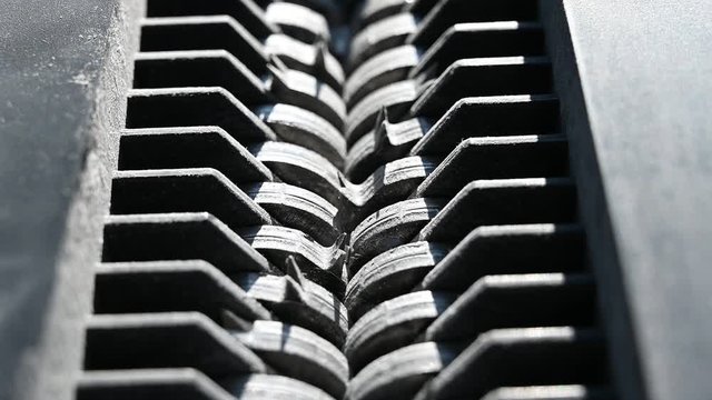 closeup view of office paper shredder teeth 