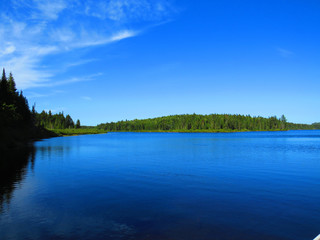 Viewpoint over Lake. La Mauricie National Park, Quebec Canada.Look out point with blue sky and tranquil waters landscape