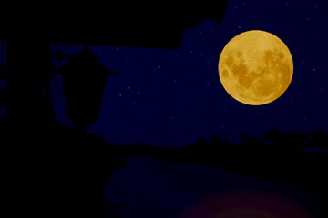Naklejka premium Full moon with silhouette river view at night.