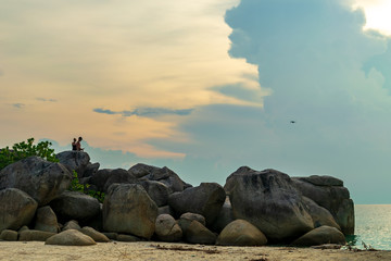 Teluk Keke Beach, Besar, Perhentian Island, Malaysia; 18-May-2019; a couple taking drone photos during sunset over Teluk Keke Beach, Perhentian Besar, Malaysia