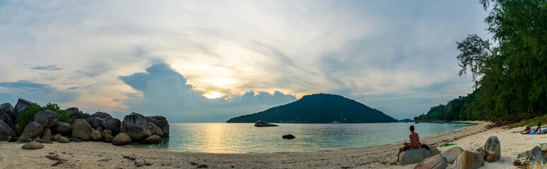 Besar, Perhentian Island, Malaysia; 18-May-2019; a panoramic view of Perhentian Kecil from Perhentian Besur at sunset, Perhentian Islands, Malaysia