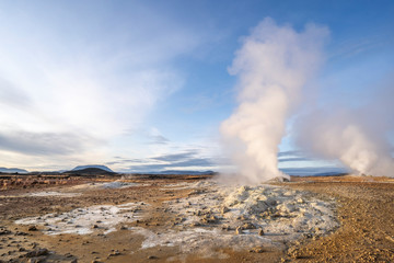 Fototapeta na wymiar steaming mud holes and solfataras in the geothermal area of Hverir near lake Myvatn, northern Iceland
