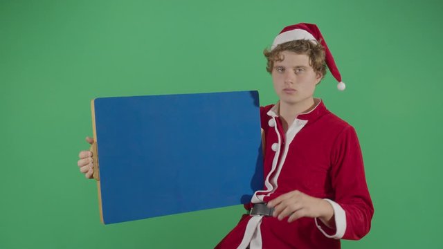 Adult Man Santa Claus Making Something Appear On A Board