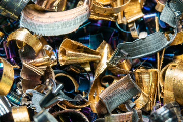 Industrial waste in the form of sharp metal chips. Industrial metal debris.