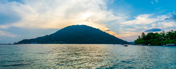 Besar, Perhentian Island, Malaysia; 18-May-2019; a panoramic view of Perhentian Kecil from Perhentian Besur at sunset, Perhentian Islands, Malaysia