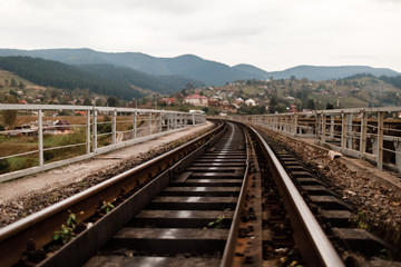 Fototapeta na wymiar railway track in the Carpathian Mountains. railway sleepers