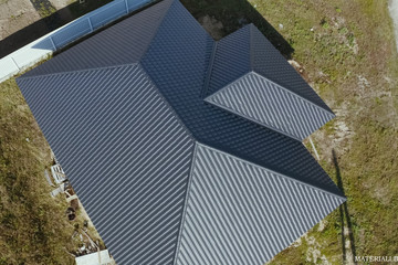 Corrugated metal roof and metal roofing. Modern roof made of met