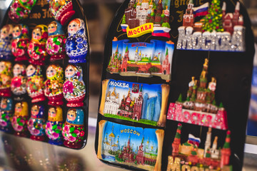 Fototapeta na wymiar View of traditional souvenirs from Moscow, Russia, with fridge magnets with 