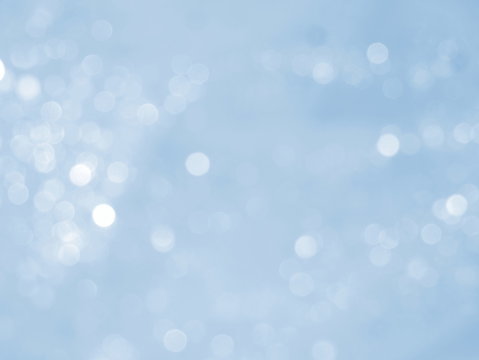 Blue background with abstract bokeh. Winter lights. 