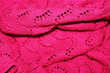 Beautiful knitted pink sweater close up view