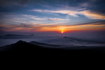 Oltarik is a castle ruin on the hill of the same name in the Ceske stredohori Mountains. It rises above the village of Dekovka ten kilometers southwest of Lovosice in the district of Litomerice
