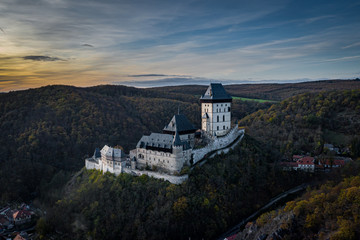 Fototapeta na wymiar Karlstejn Castle is a large Gothic castle founded 1348 CE by Charles IV, Holy Roman Emperor-elect and King of Bohemia. There are hidden Czech crown jewels, holy relics, and other royal treasures. 