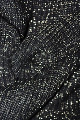 Beautiful knitted black sweater close up view