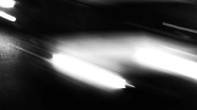 Hyper speed - urban movement fhd loop. Contrast blurred lines. Modern cityscape - night street road traffic. Super fast cars lights. Night motion time lapse. Minimal background texture.