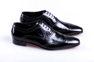 black leather shoes isolated on white background