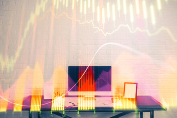 Stock market graph on background with desk and personal computer. Multi exposure. Concept of financial analysis.