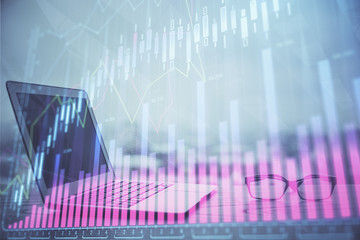 Forex Chart hologram on table with computer background. Multi exposure. Concept of financial markets.