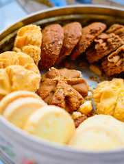 Closeup of Mixed Flavor Cookies in Round Box