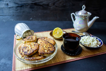 morning breakfast tea with cottage cheese on a serving board, top view