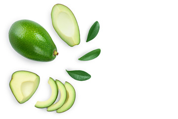 avocado and slices decorated with green leaves isolated on white background with copy space for your text. Top view. Flat lay