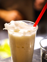 Thai Coconut Milk Shake With Coconut Chips on Top