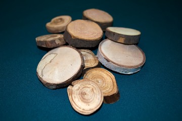 Wooden saw cuts on a green background.
