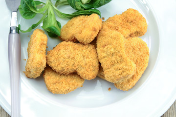 chicken nuggets on a plate