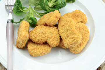 chicken nuggets on a plate