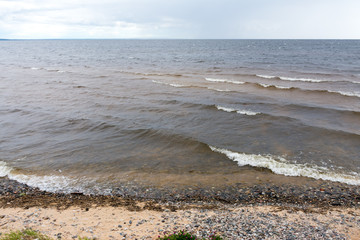shore of lake Onega in cloudy weather