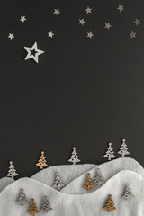 Christmas composition. Stars fir mountains top view background with copy space for your text. Flat...