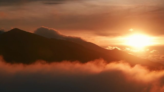 Beautiful sunset mountain ridge with cloud 4k footage in Dolomites Italy