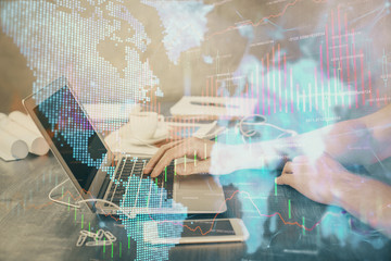 Double exposure of forex chart with man working on computer on background. Concept of market analysis.