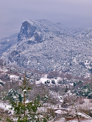 View to snow covered Olympus mountains and Litohoro village,  winter landscape.