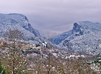 View to snow covered Olympus mountains and Litohoro village,  winter landscape.