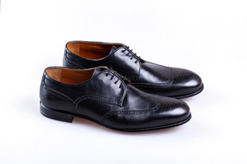 pair of black shoes isolated on white background