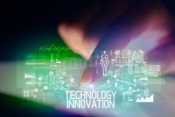 Finger touching tablet with web technology icons and TECHNOLOGY INNOVATION inscription