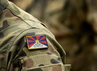 Flag of Tibet on military uniform. Army, armed forces, soldiers. Collage.