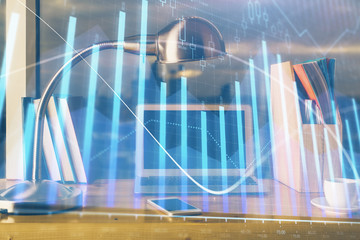 Forex market graph hologram and personal computer on background. Double exposure. Concept of investment.