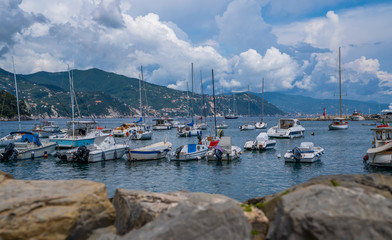 Fototapeta na wymiar Fantastic summer vacation destination, superb Santa Margareta Luguria mediterranean cityscape with colorful buildings and boats, yachts in the bay. Italy, Europe.