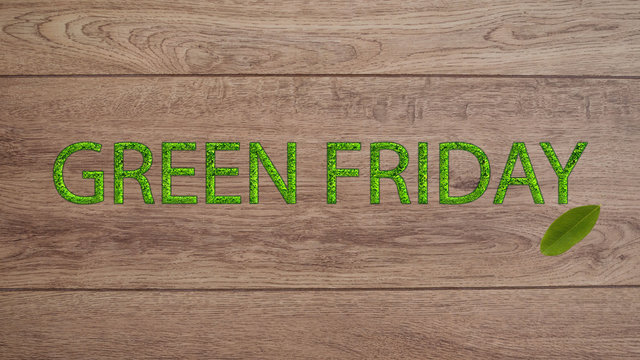 Green Friday concept. Leaf with text Green Friday on the wooden Background. Banner long format