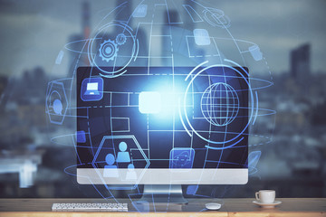 Computer on desktop with social network theme icon. Multi exposure. Concept of international connections.