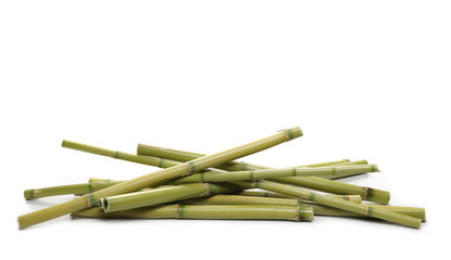 Green bamboo sticks isolated on white background, side view